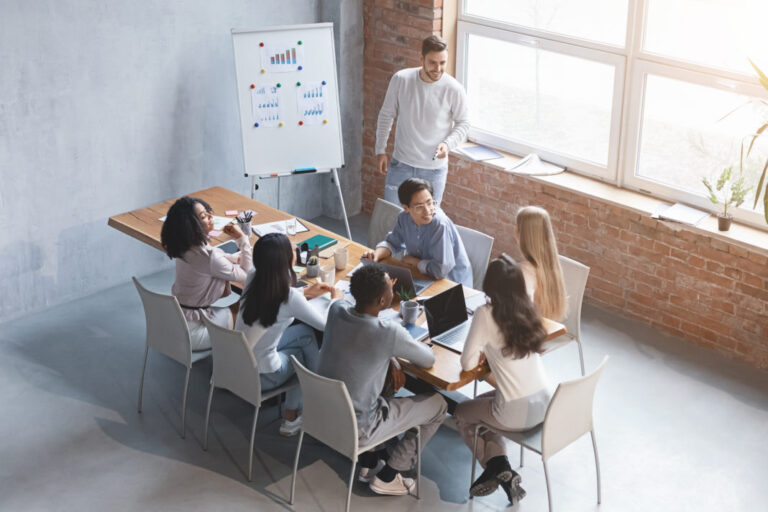 creative business team listening to marketing report